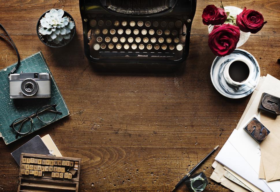 Free Image of Typewriter and Coffee Cup on Table 