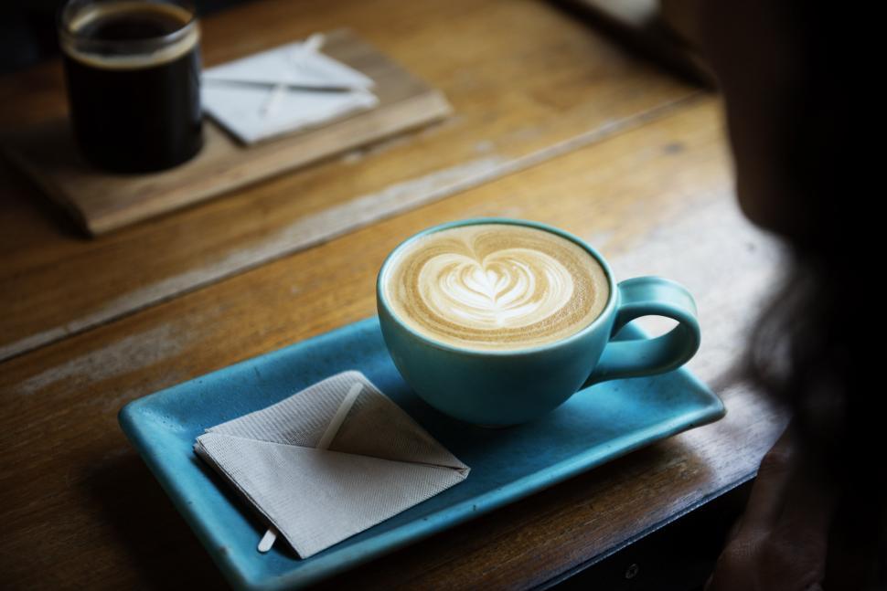 Free Image of Cappuccino on Blue Plate on Wooden Table 