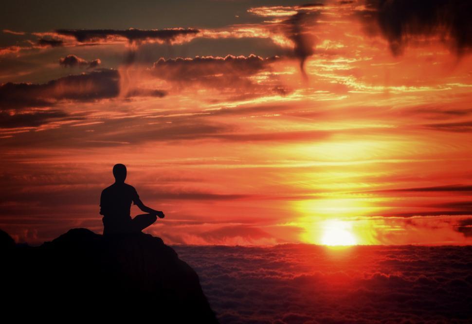 Free Image of Meditation - Mindfulness - Person Meditating at Sunset Over the  