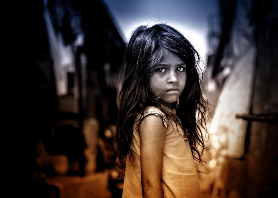 Free Image of Little Girl with Sad Eyes 