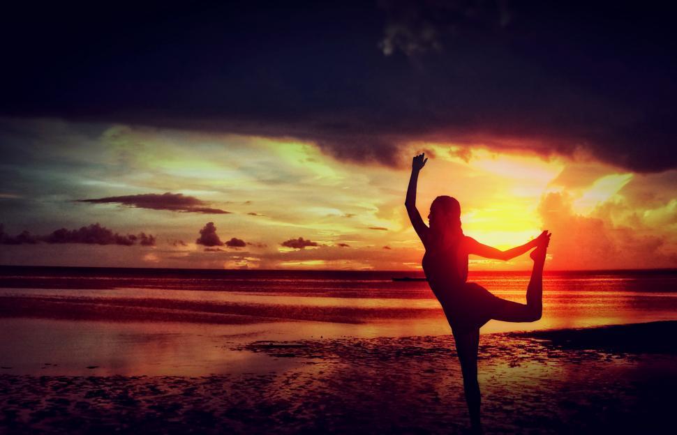 Free Image of Woman Practising Yoga at the Beach 