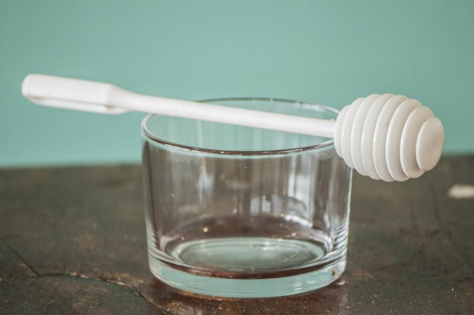 Free Image of A Glass of Water With a Toothbrush 