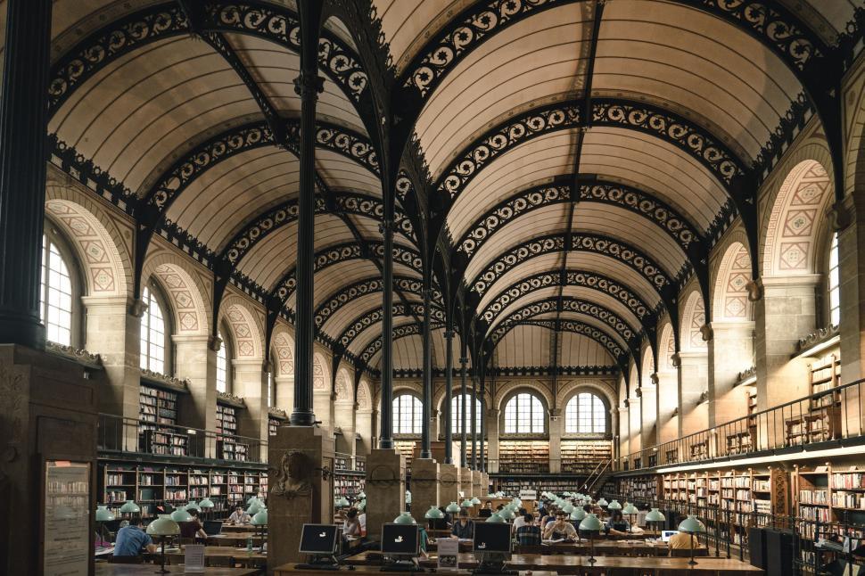 Free Image of Extensive Library Filled With Books 