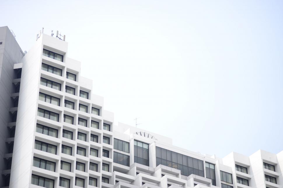 Free Image of Tall White Building With Clock on Top 