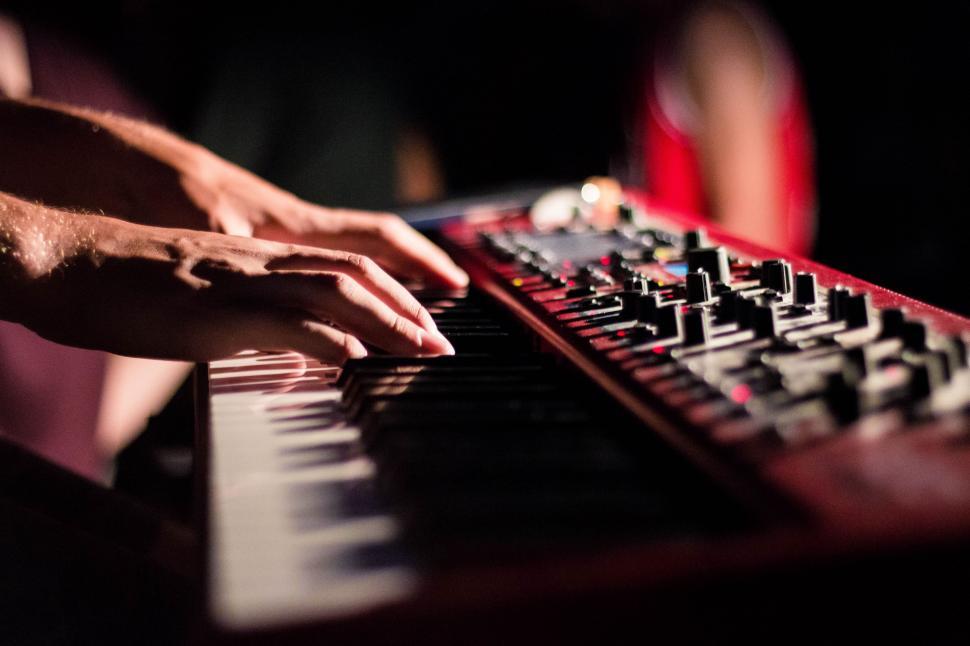 Free Image of Close Up of Person Playing Keyboard 