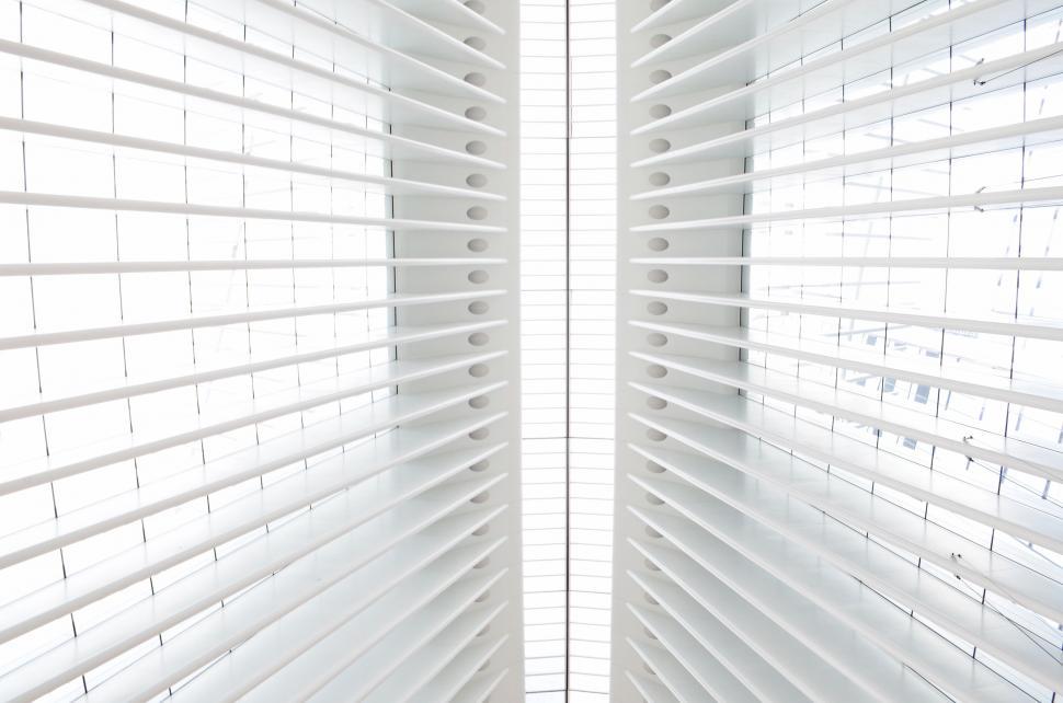 Free Image of White Room With Large Window Covered in Blinds 