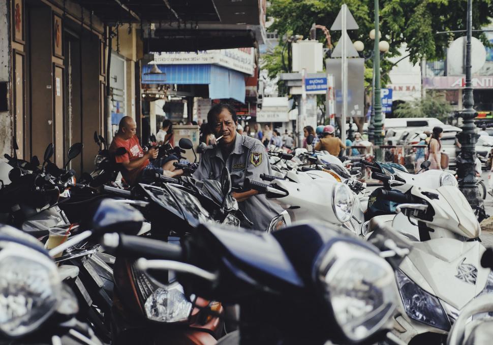 Free Image of Group of Motorcycles Parked Next to Each Other 