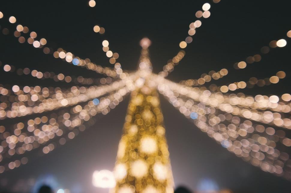 Free Image of Blurry Christmas Tree at Night 