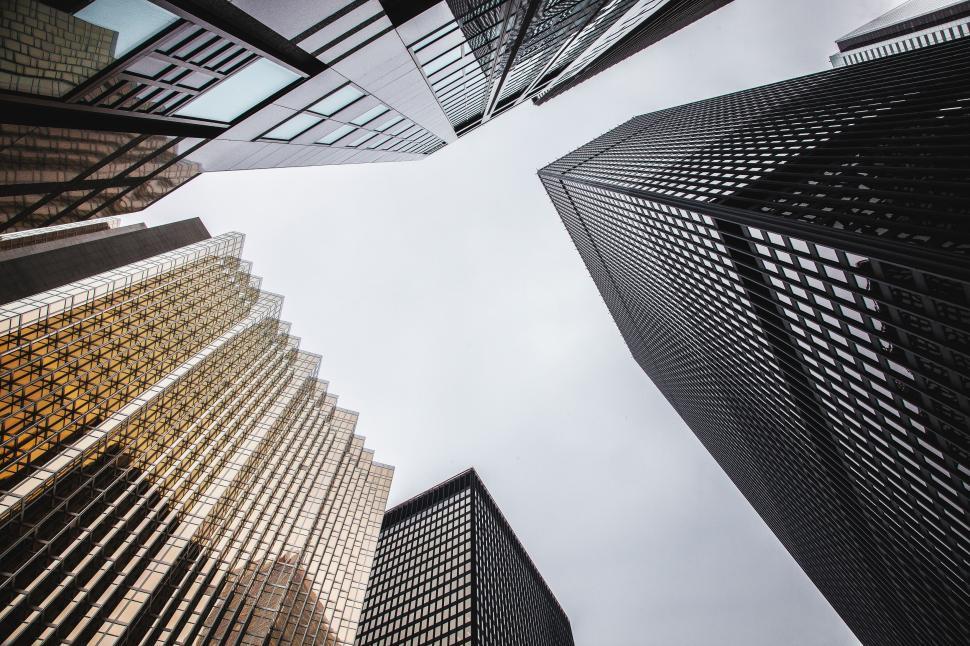 Free Image of Looking Up at Tall Buildings in a City 