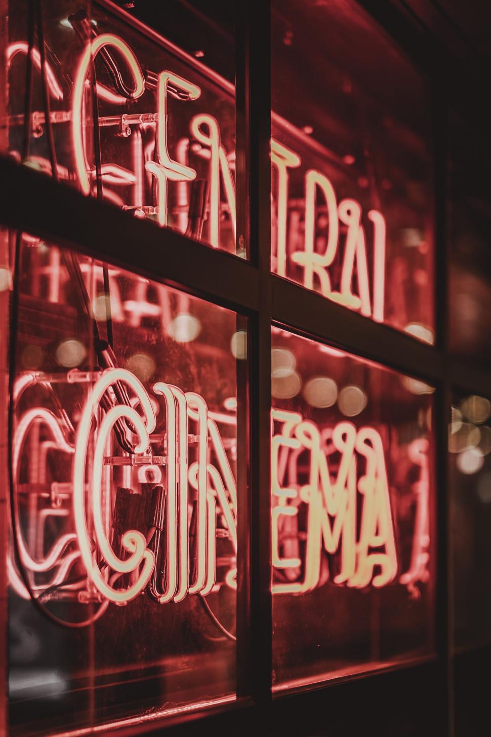 Free Image of Vibrant Red Neon Sign in Store Window 