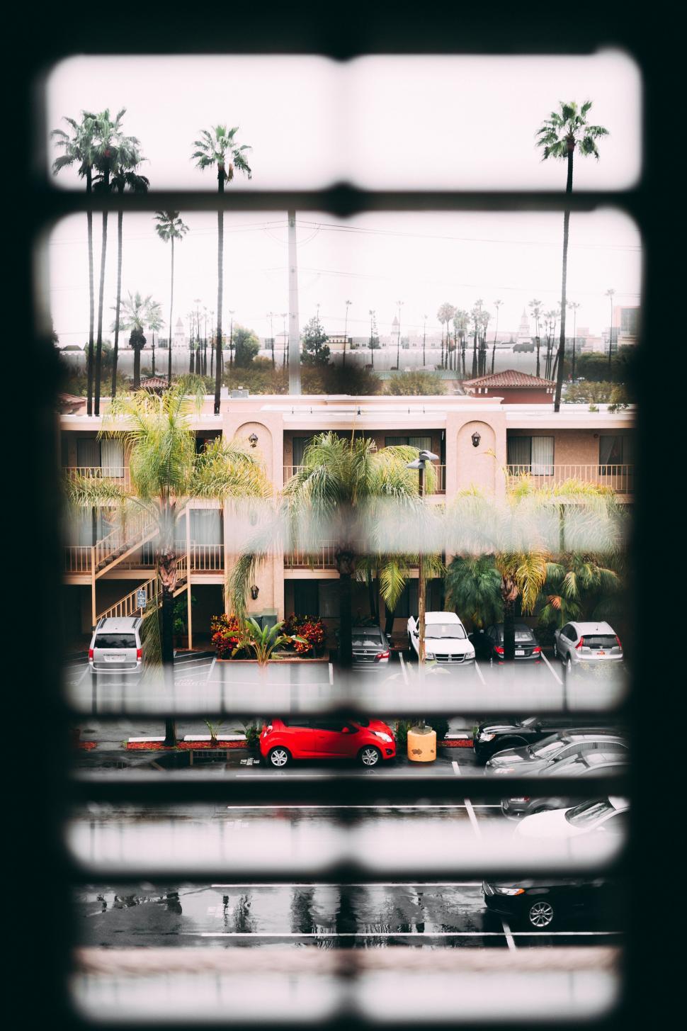 Free Image of View of a Parking Lot Through a Window 