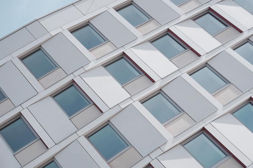 Free Image of Tall Building With Windows 
