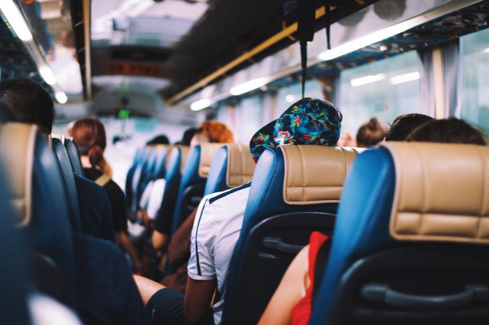 Free Image of Group of People Sitting on a Bus 