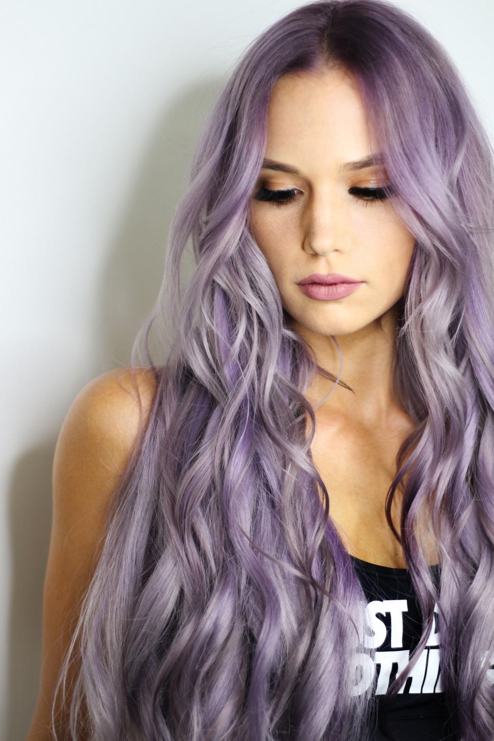 Free Image of Woman With Long Purple Hair and Black Tank Top 