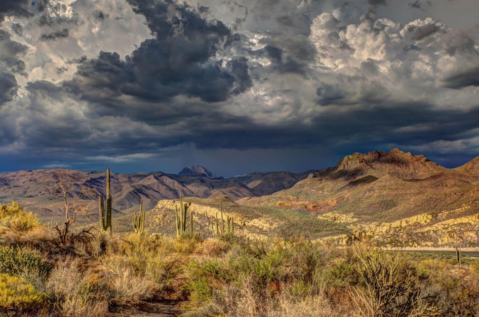 Free Image of Desert Landscape With Mountains and Clouds 