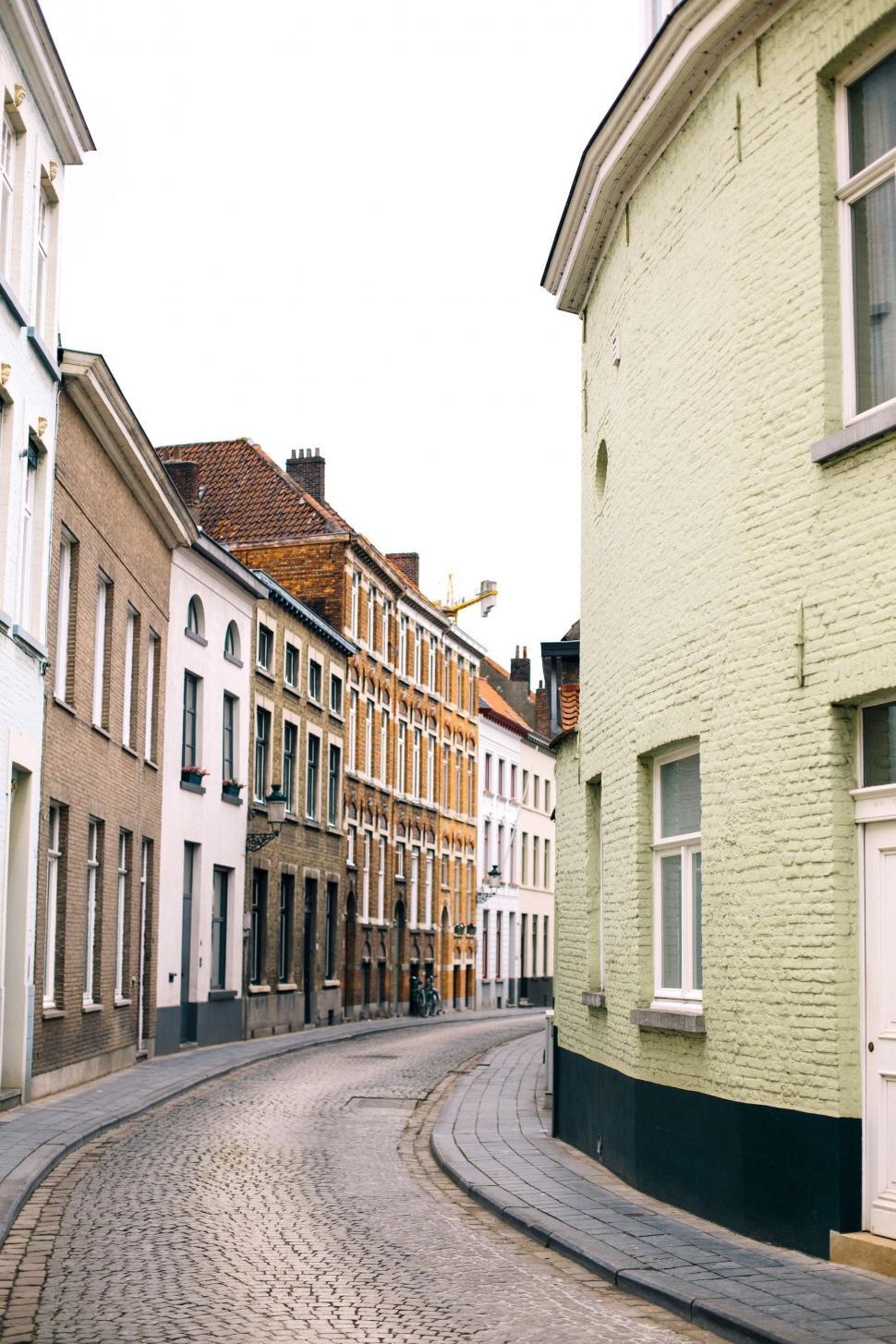 Free Image of Historic Cobblestone Street in European City 