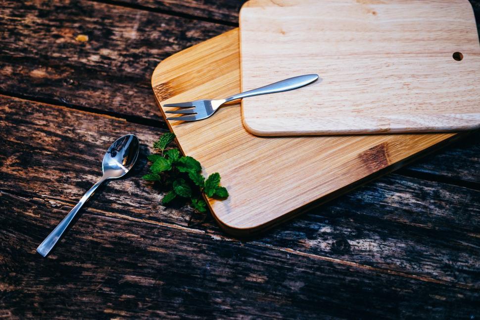 Free Image of Cutting Board With Knife and Fork 