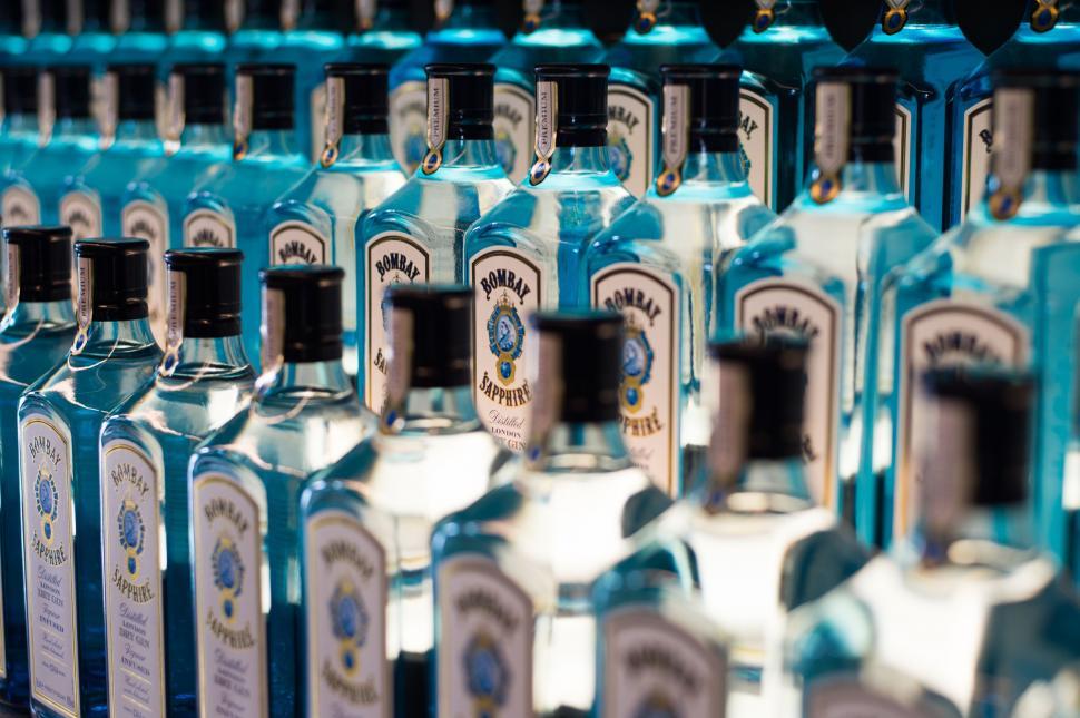 Free Image of Row of Blue Bottles of Alcohol 