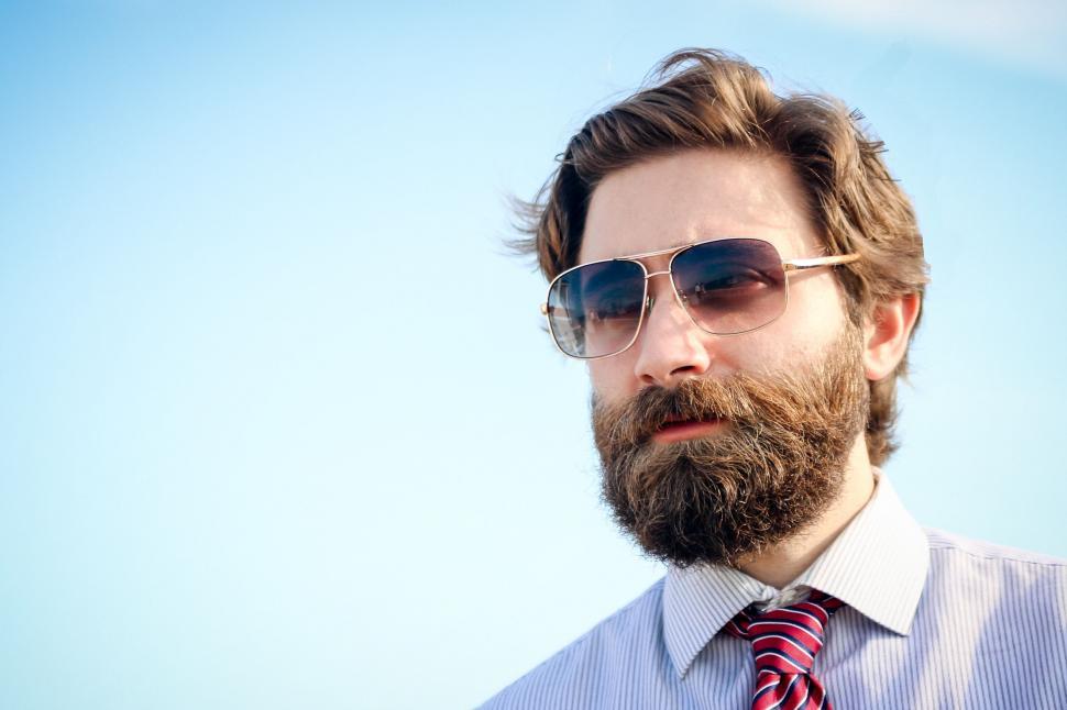 Free Image of Bearded Man in Sunglasses and Tie 