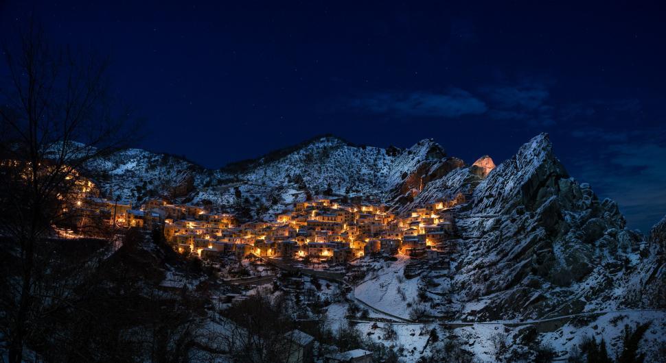 Free Image of Night Time View of a Mountain Town 
