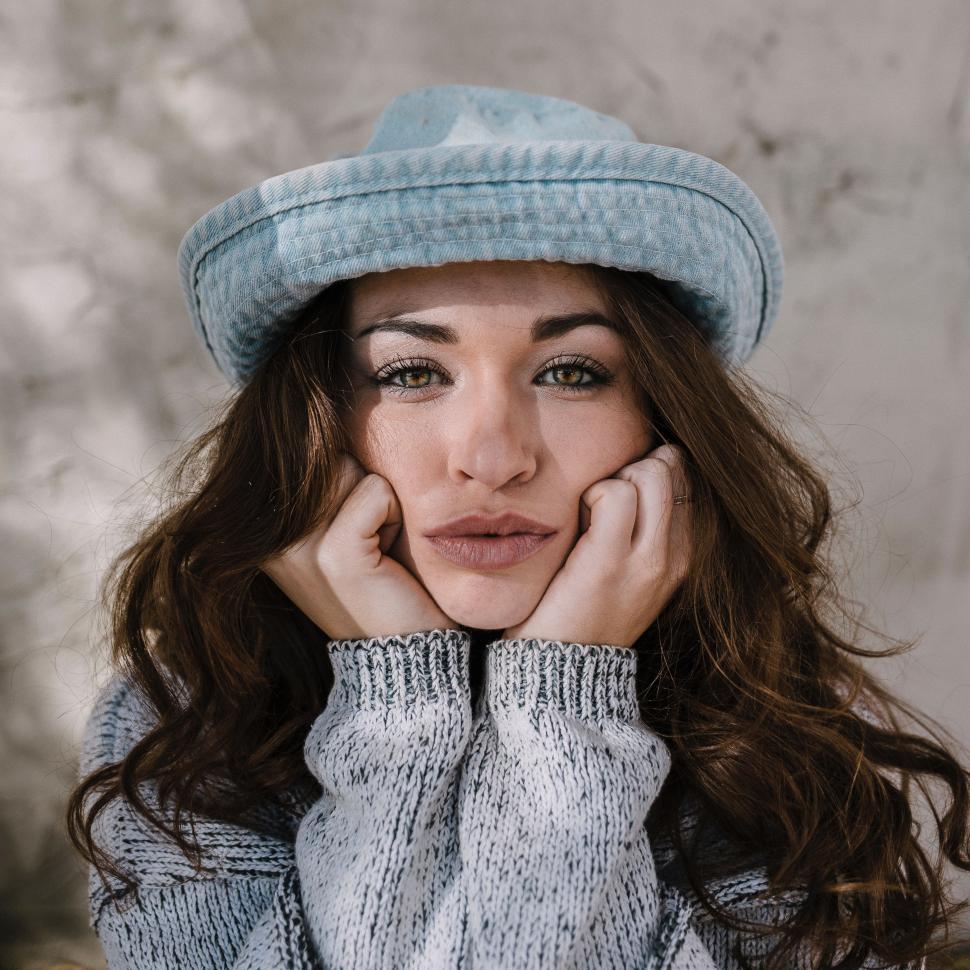 Free Image of Woman Wearing Blue Hat and Sweater 