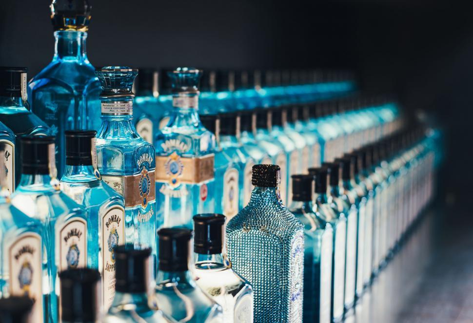 Free Image of Row of Bottles Displayed on a Shelf 