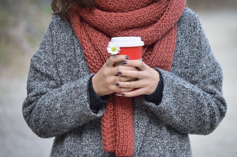 Free Image of Woman Holding a Cup of Coffee 