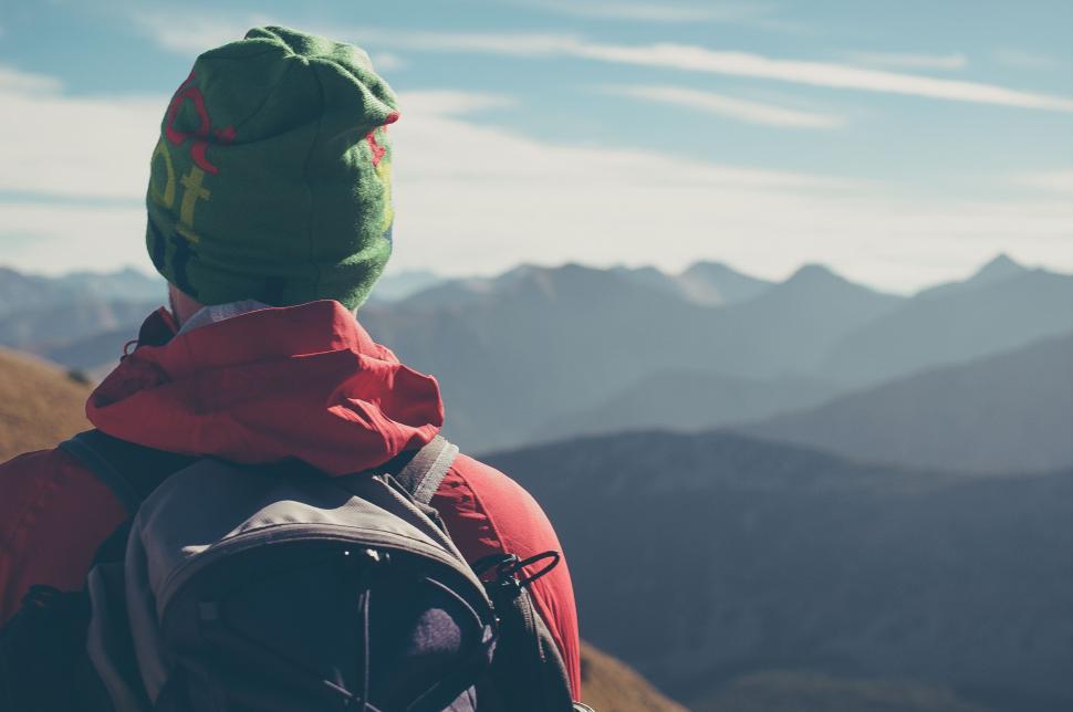 Free Image of Person With Backpack Admiring Mountain View 