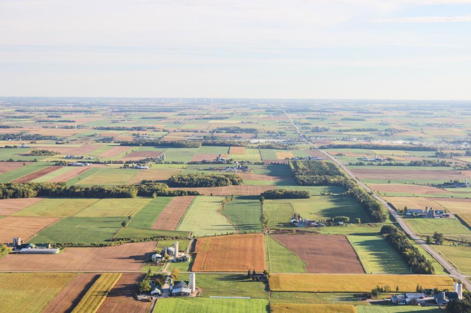 Free Image of Aerial View of Farm Land With Road 