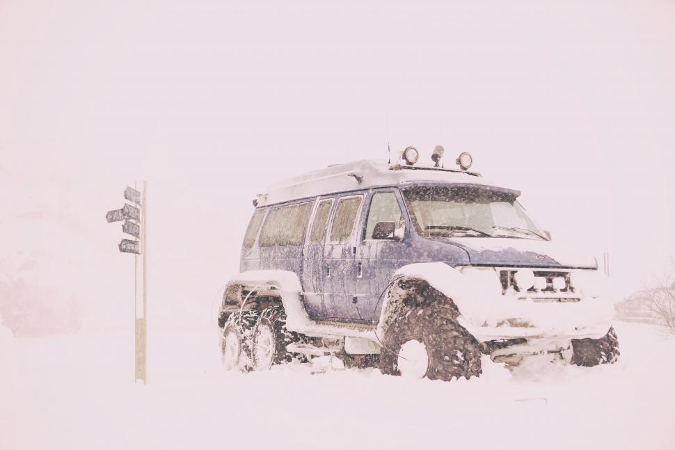 Free Image of Vehicle Driving Through Snow 