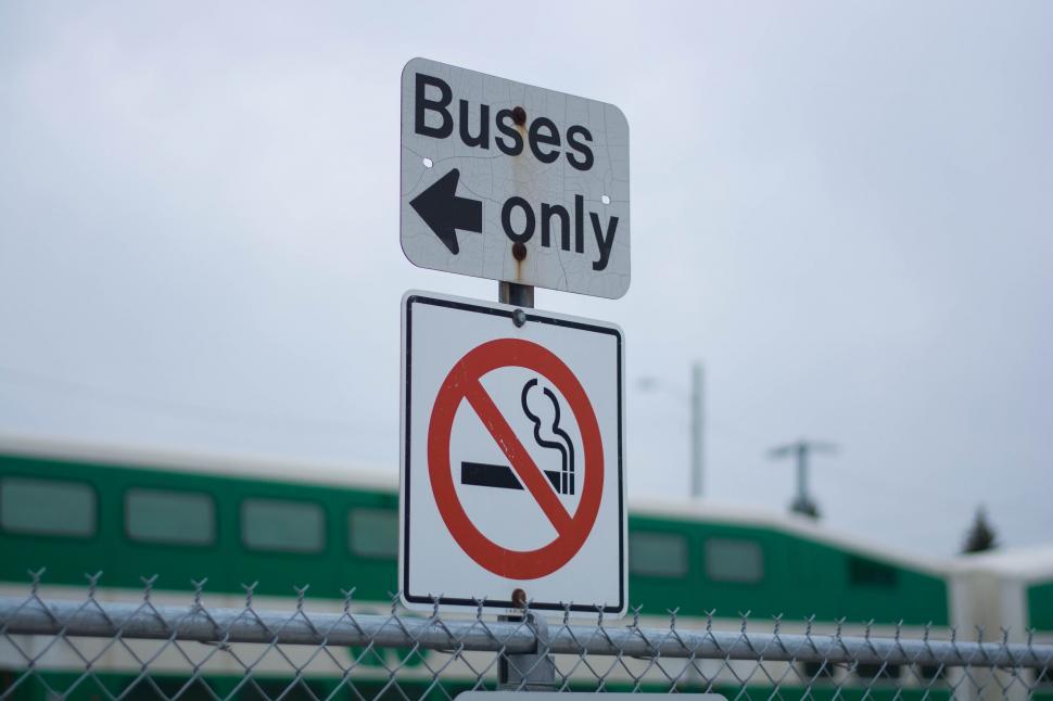 Free Image of Buses Only and No Smoking Street Signs 