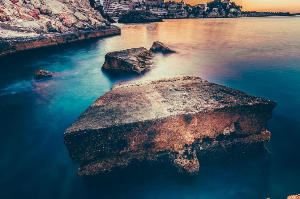 Free Image of Body of Water With Rocks 