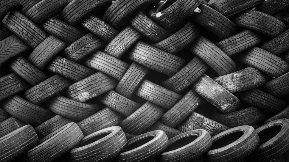 Free Image of Stacked Tires in Black and White 