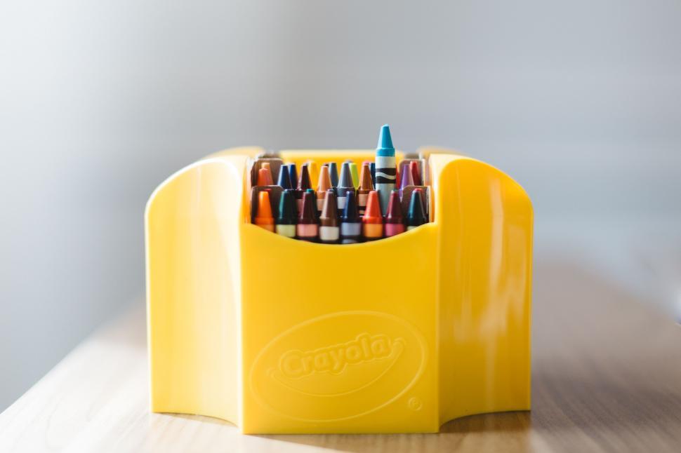 Free Image of Yellow Pen Holder With Pens 