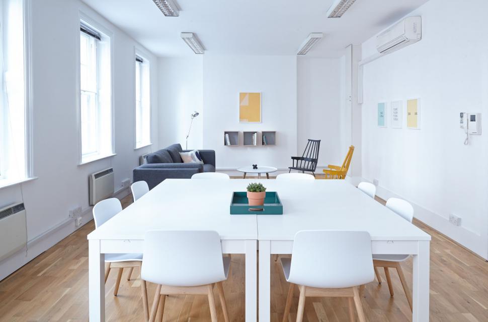 Free Image of White Table and Chairs in a Room 