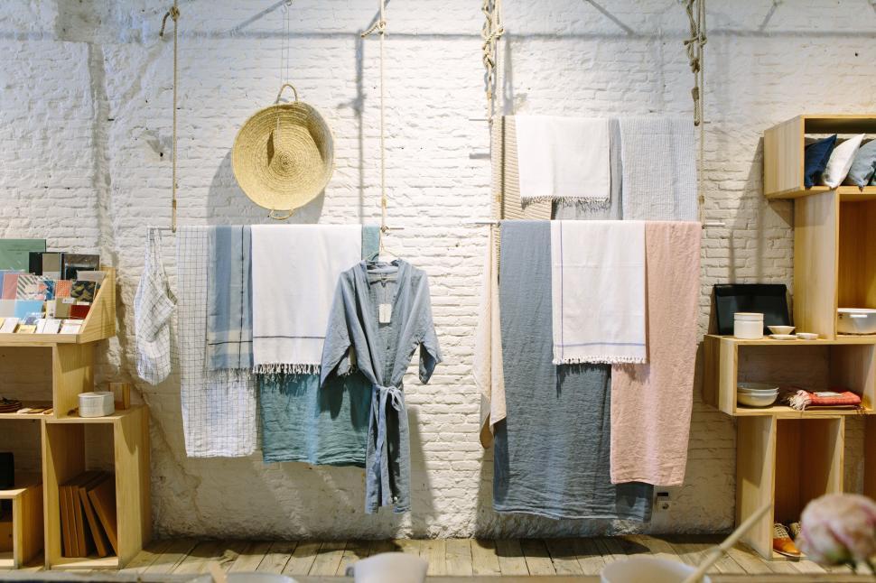 Free Image of Room With Clothes Hanging on a Rack 