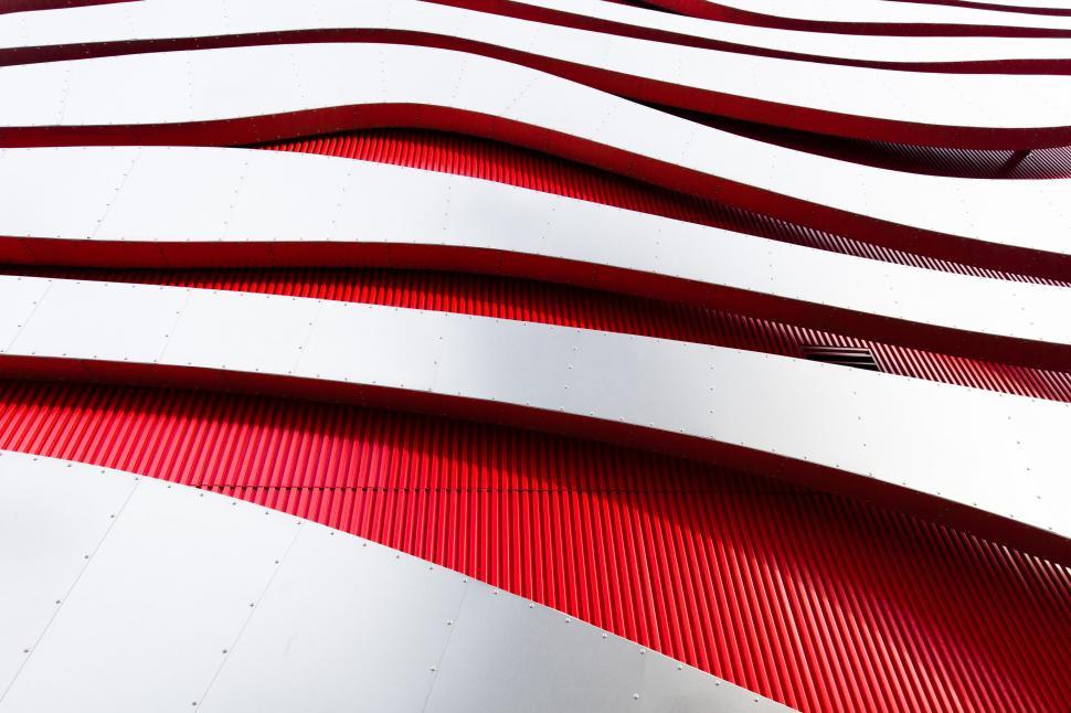 Free Image of Red and White Abstract Background With Wavy Lines 