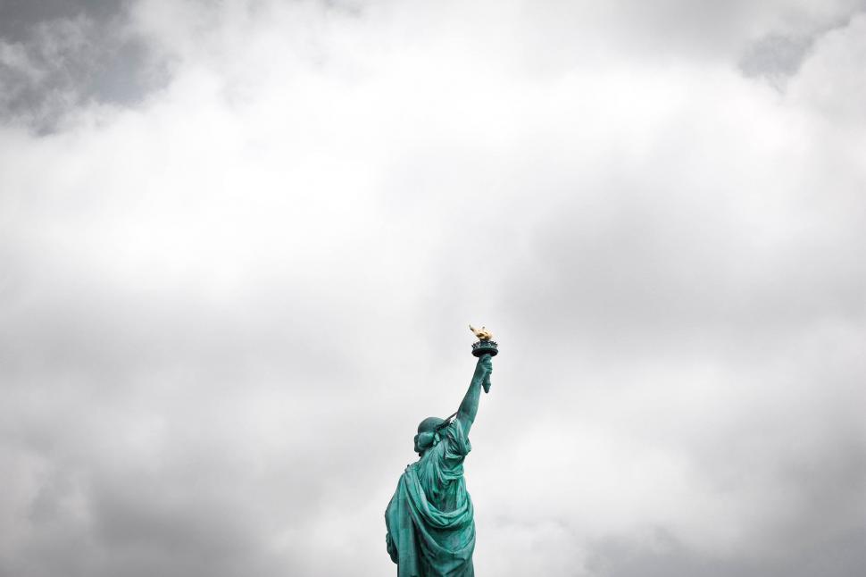 Free Image of Statue of Liberty Against Cloudy Sky 