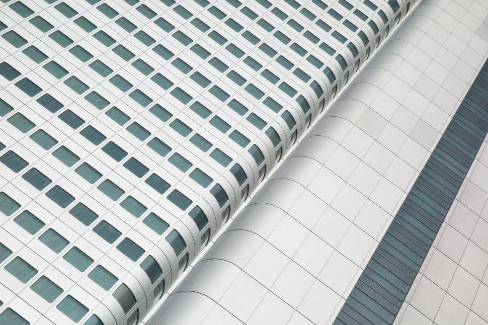 Free Image of Modern White Skyscraper With Abundant Windows 