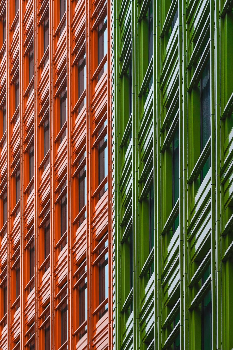 Free Image of Close Up of Two Different Colored Buildings 