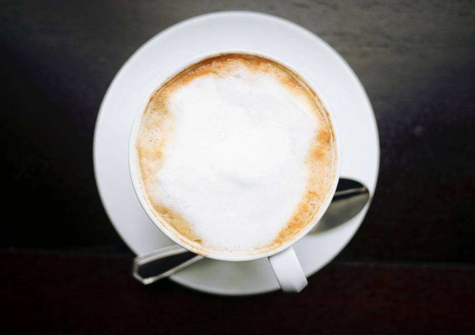 Free Image of Cappuccino on Saucer With Spoon 