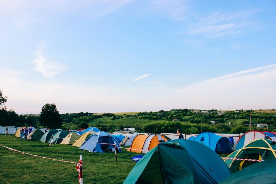 Free Image of Group of Tents Arranged in Field 