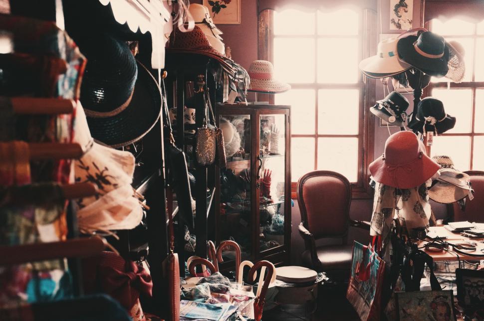 Free Image of Room Filled With Clutter and Hats 