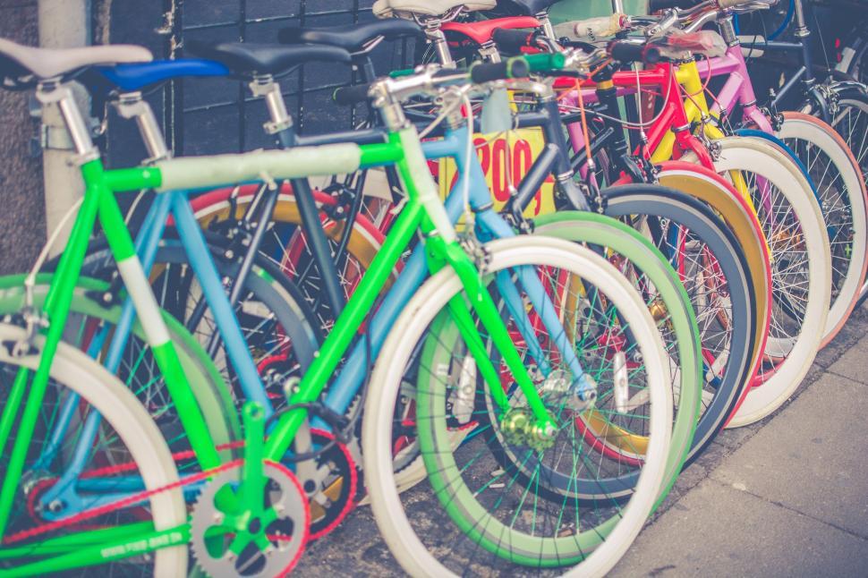 Free Image of A Row of Colorful Bikes Parked Next to Each Other 
