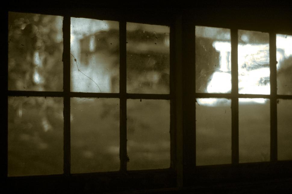Free Image of Blurry Photo of a Window in a Dark Room 