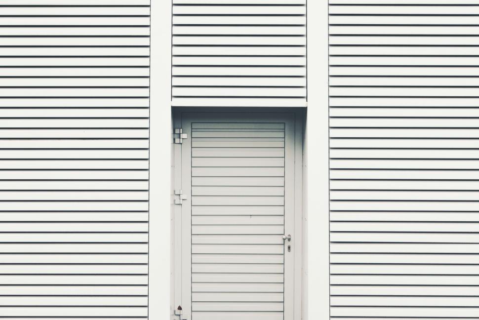 Free Image of White Building With White Door and Window 