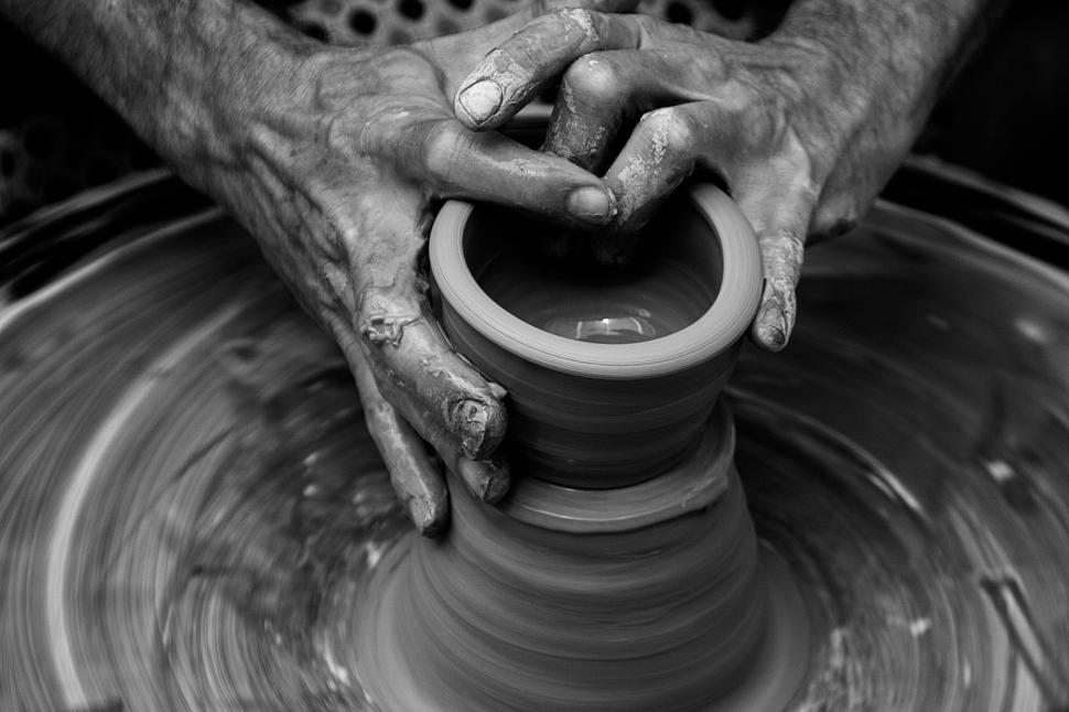 Free Image of Person Crafting Vase on Potters Wheel 