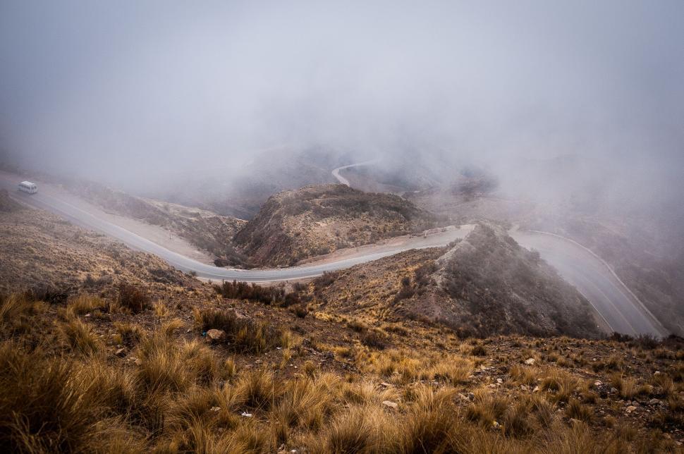 Free Image of Misty Mountain With Winding Road 