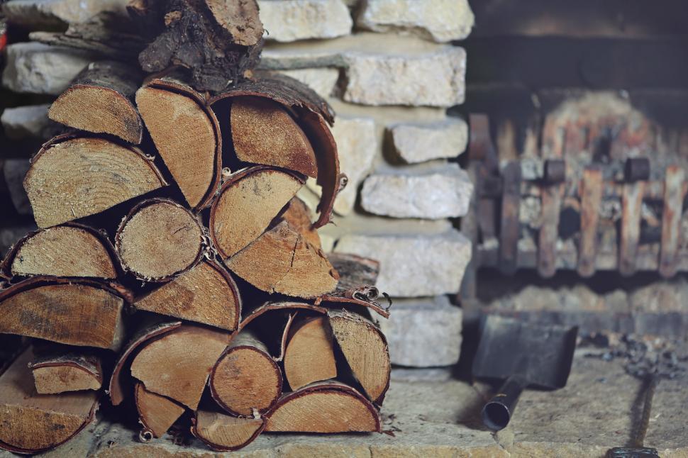 Free Image of Pile of Wood Next to Pile of Firewood 