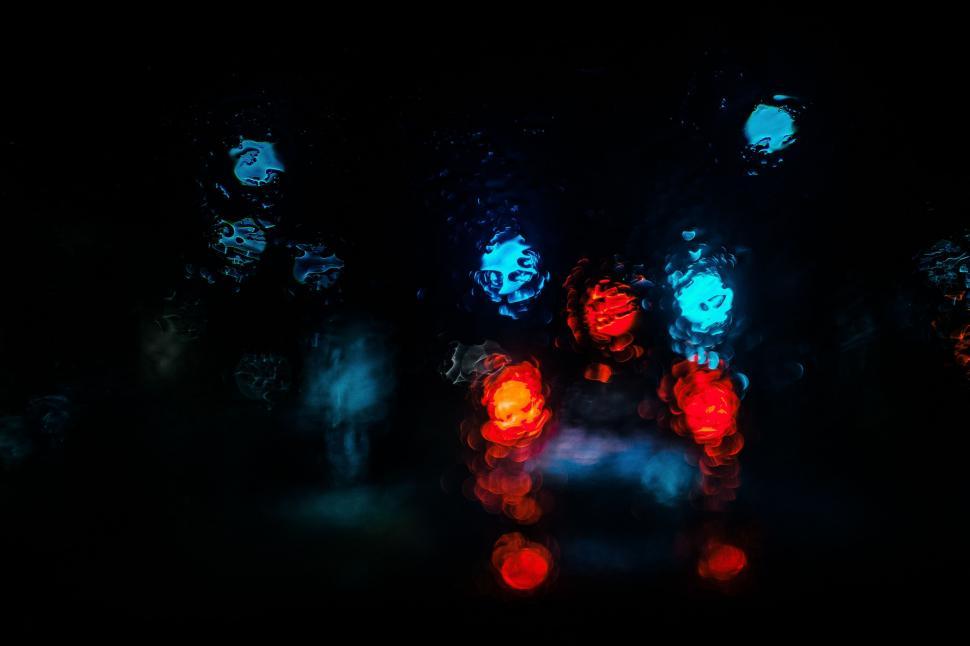 Free Image of Blurry Traffic Lights in the Dark 